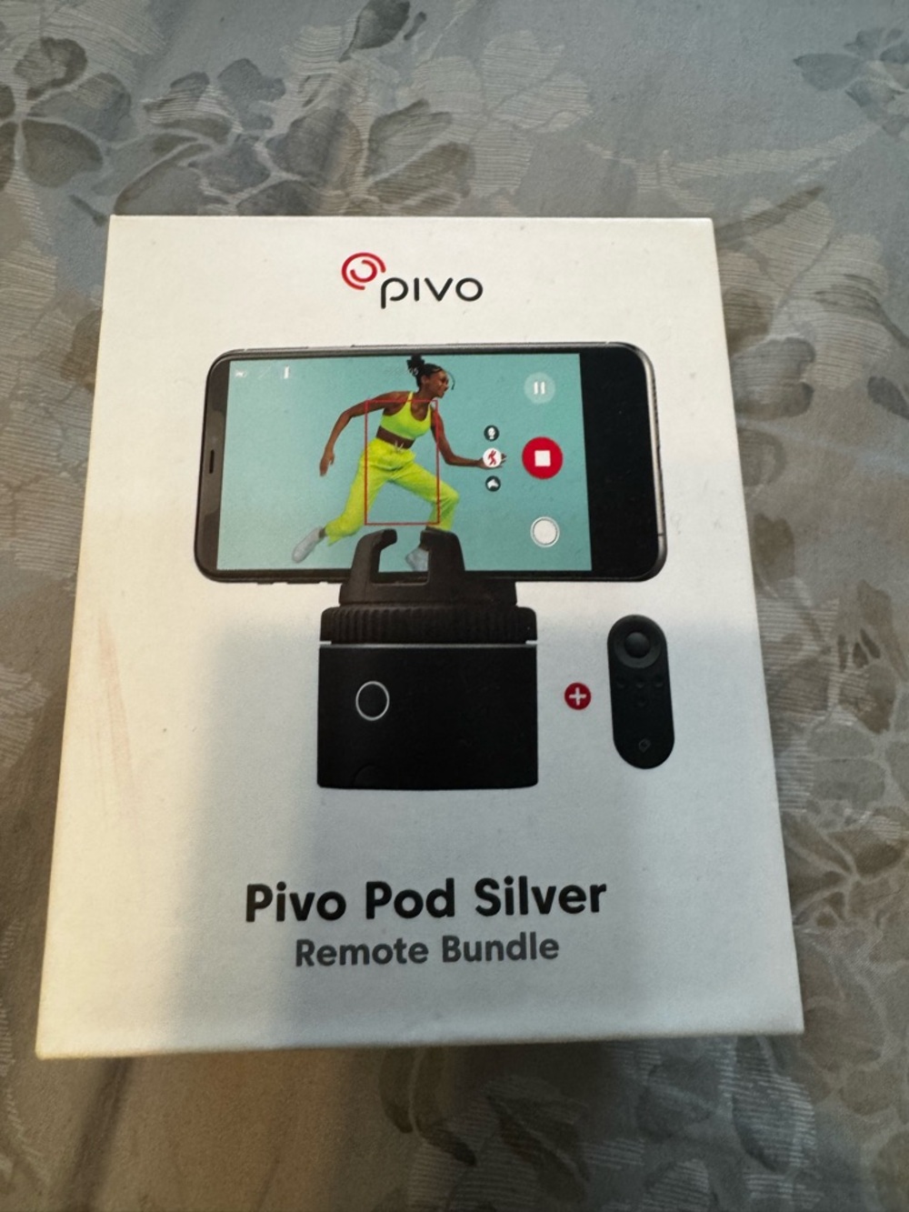 Pivo Pod Silver. Auto tracking mount for cell phone.